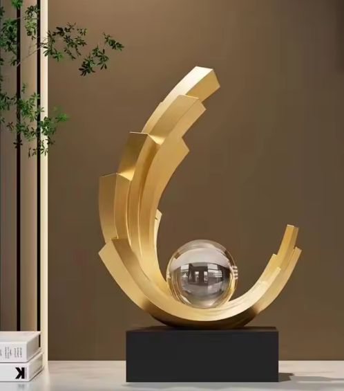 Light luxury smooth sailing gold arc ornament figurine with crystal sphere on black plinth for home living room decor