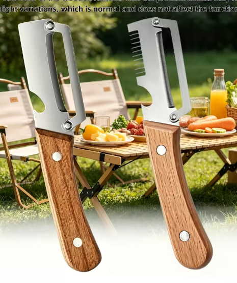 Multi-functional stainless steel peeler with wooden handle displayed outdoors on a picnic table